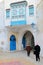 Typical cobbled and narrow street  inside the historical medina of Kairouan in Tunisia