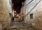 Typical cobbled stairs in a side street alleyway iin the Sassi di Matera a historic district in the city of Matera.