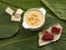 Typical Colombian food - Paisa corn mazamorra with sweet guava paste
