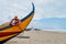 Typical colourful Moliceiro fishing boats on the beach in Espinho, Portugal