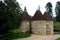 Typical converted Oast House in a remote setting in a village in Kent, England, UK. Oast houses in group constructed