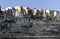 Typical Corsican houses on a cliff overlooking the sea in the port of Bonifacio