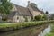Typical Cotswold cottages on the River Eye, Lower Slaughter, Gloucestershire, Cotswolds, England, UK