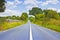 Typical country road in the Irish rural areas in the summer season Ireland