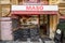 Typical Czech butcher shop in downtown Prague with the daily offers displayed.