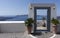 Typical design decoration door of Santorini Greece with way into the sea with copy space