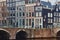 Typical dutch architecture, canal and bridge in Amsterdam