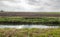 Typical Dutch flat polder landscape in autumn