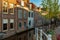Typical Dutch houses along the water canal in Delft, South Holland Netherlands