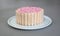 Typical Dutch mouse rusk with pink mice on a cake, baby girl shower