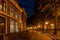 A typical Dutch street The Hooglandse Kerkgracht, with old buildings and beautiful, lighted lamp posts, Leiden, the Netherlands