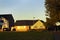 Typical English brick house. Autumn sunny day. Street view.