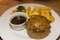 A typical English style dinner with meat pie and chips