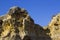 Typical exposed sedimentary sand stone cliff face on the Praia da Oura beach in Albuferia