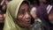 The typical face of Javanese Muslim women at a religious event. Focus selected