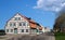 Typical fachwerk house of old Klaipeda, Lithuania medieval town and cobbled pavement street. German style buildings of