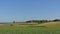 Typical flemish farm landscape with historic windmill