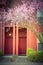 Typical front porch entrance of attached townhouse with blooming cherry in Seattle, WA
