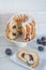 Typical German poppy seed plum gugelhupf cake on a table