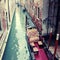 Typical gondola at narrow venetian canal, Venice, Italy.