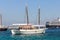 Typical Greek sailing yacht in Mykonos harbour,