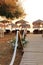 Typical greek scene at the kalives beach with wooden chairs and table