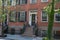 Typical Greenwich Village brick stone houses with iron railings and stairs