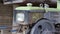 Typical heavy diesel walking tractor with trailer. Agricultural transport equipment of the countryside. Portable
