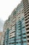 Typical high rise apartment building with balcony and windows. Contemporary architecture. Selective focus. Close-up