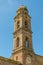 Typical historic Italian church tower with bells and clock in Siena, Italy, Europe