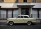 Typical house in London with cream vintage car