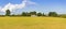 Typical Irish flat landscape with farms and fields of grass