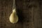 Typical Italian cheese Caciocavallo on the background of a rough wooden texture