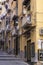 A typical Italian cityscape, colorful buildings, narrow street, Naples, Italy