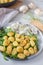 Typical Italian Gnocchi with mushroom sauce and arugula salad