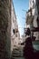 Typical Italian Street in Ostuni with a Balcony and Blue Sky Background