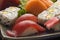 Typical Japanese food in decorated and colorful dishes, Sushi and Sashimi