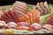 Typical Japanese food in decorated and colorful dishes, Sushi and Sashimi