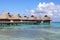 Typical landscape of tropical islands - huts, wooden houses over water