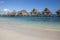 Typical landscape of tropical islands - huts, wooden houses over water