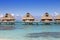 Typical landscape of tropical islands - huts, wooden houses over water