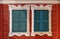 Typical Ligurian painted house with painted windows: one is a tr