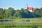 Typical Lithuania landscape .View on Kurtuvenai church.