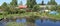 Typical Lithuanian rural landscape - on the bank of a forest pond no name poor village