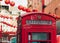 Typical London red telephone booth in Chinatown, in the Soho district