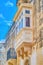 The typical Maltese balcony in Mosta