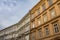 Typical Medieval Facade of an old appartment residential building in a street of old town, historical center of Prague, Czechia