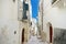 Typical medieval narrow street in beautiful town of Vieste