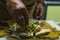 Typical Mexican street food vendor, prepares a dish originally from Michoacan, Mexico called Corundas