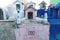 Typical Mexican tombstones with tequilla bottles as decoration in a graveyard in Valladolid, Yucatan, Mexico